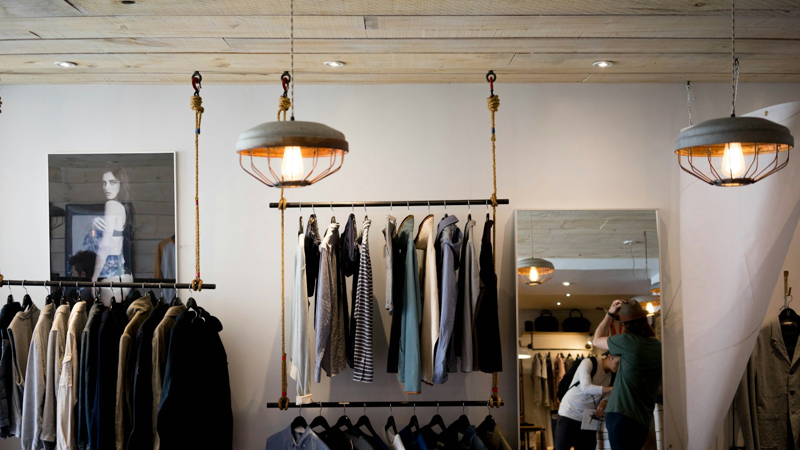 Clothing boutique interior with hanging racks